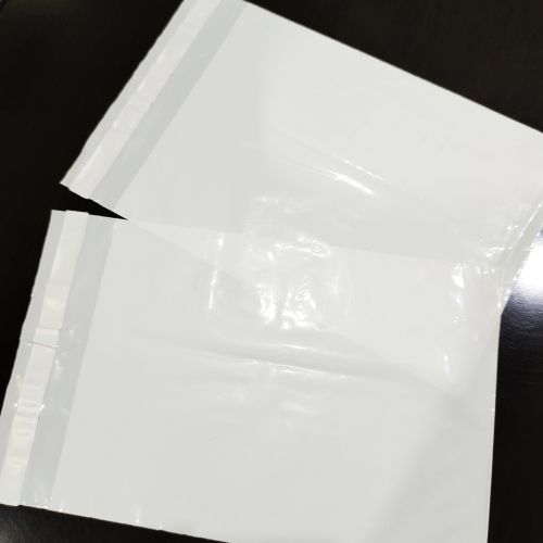 Polymailer Bag Non Print (PE Putih Susu) dengan Permanent Sealtape